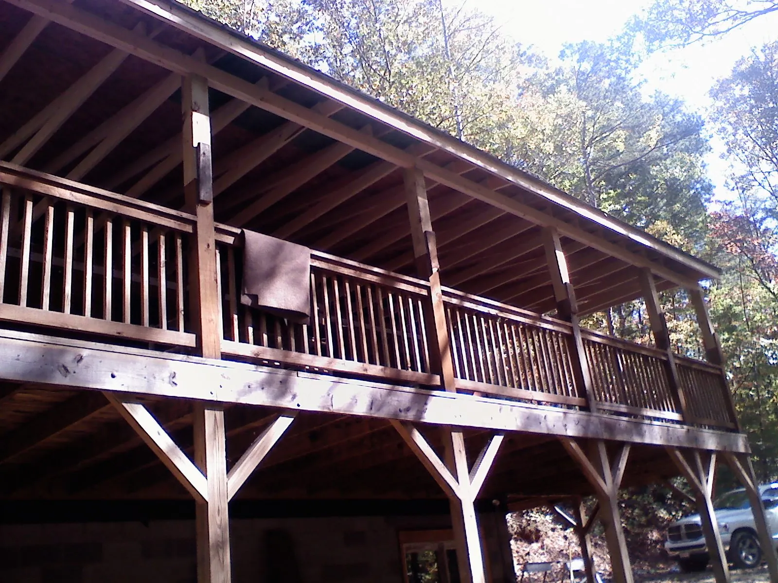 Timber framing under a new elevated porch and deck — Roof Leak Repair in Blencoe by Roofing Brothers